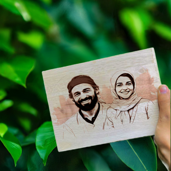 a wooden plaque with an image of a man and woman